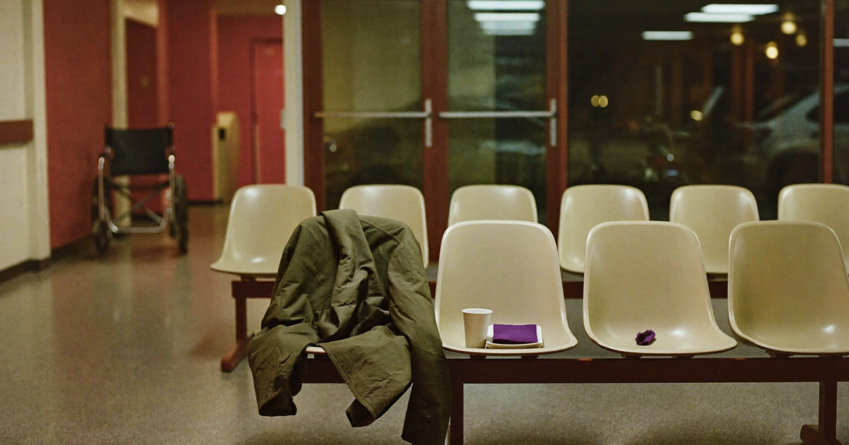 Patient with Crohn's disease waiting in an emergency room during a severe flare