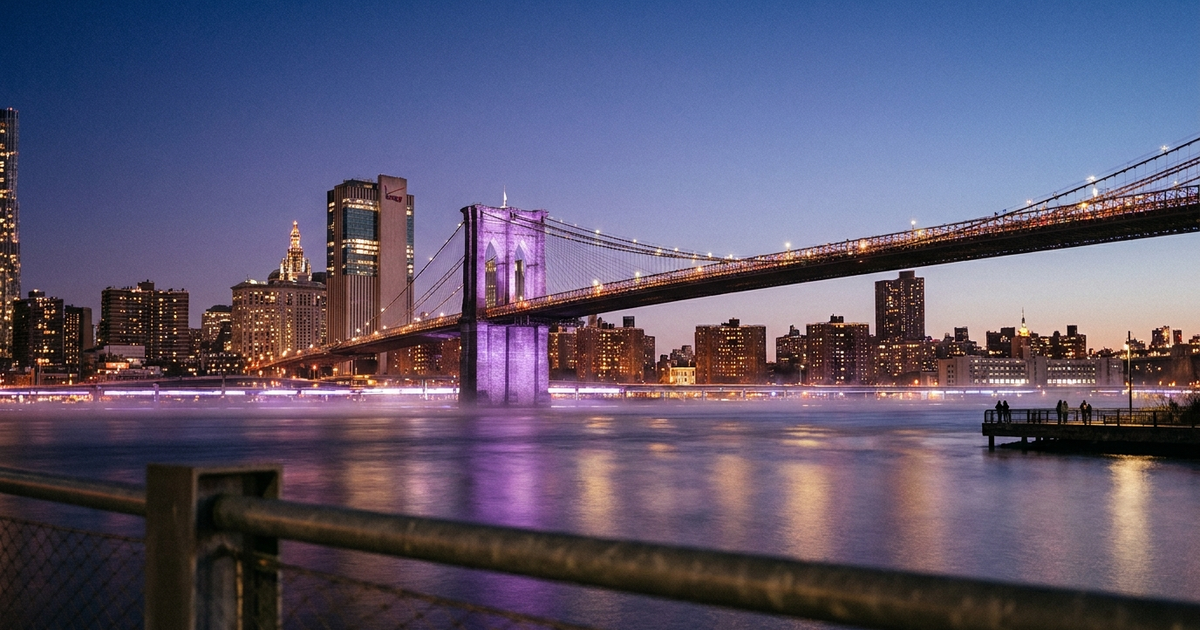 Bridge and skyline illuminated in purple light on May 19 for World IBD Day 2026 awareness